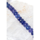 Close-up of the Violet Blue necklace highlighting high-quality graduated tanzanite stones and their luminous violet-blue tone, finished with refined gold details.