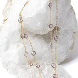 
Violet Mist gold station necklace with clear, translucent lavender amethyst stones, styled in two strands to showcase its versatile, layered wear.