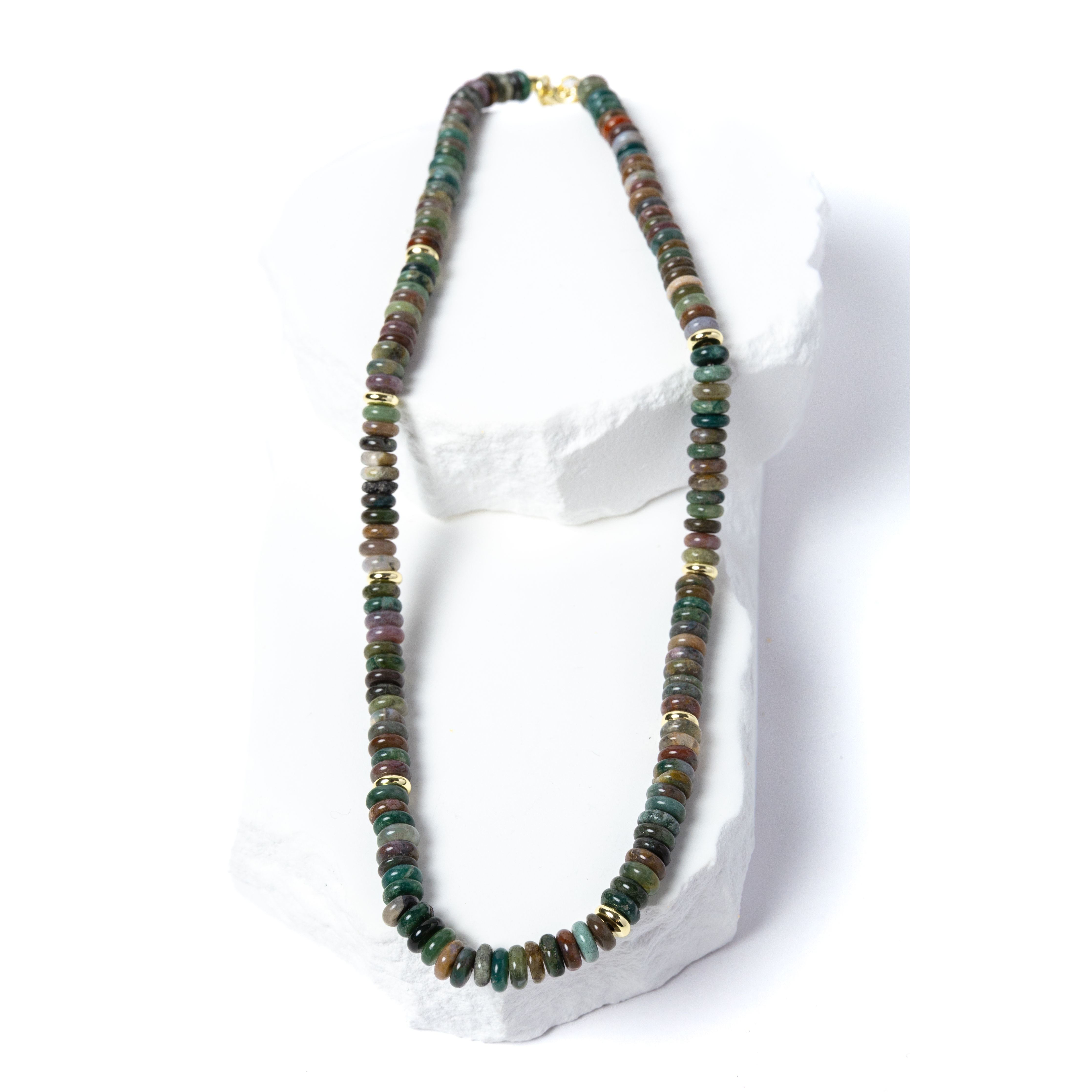 Luxury handcrafted multicolor gemstone necklace featuring polished rondelle beads in rich earthy green, teal, brown, plum, and muted natural tones with gold accents.