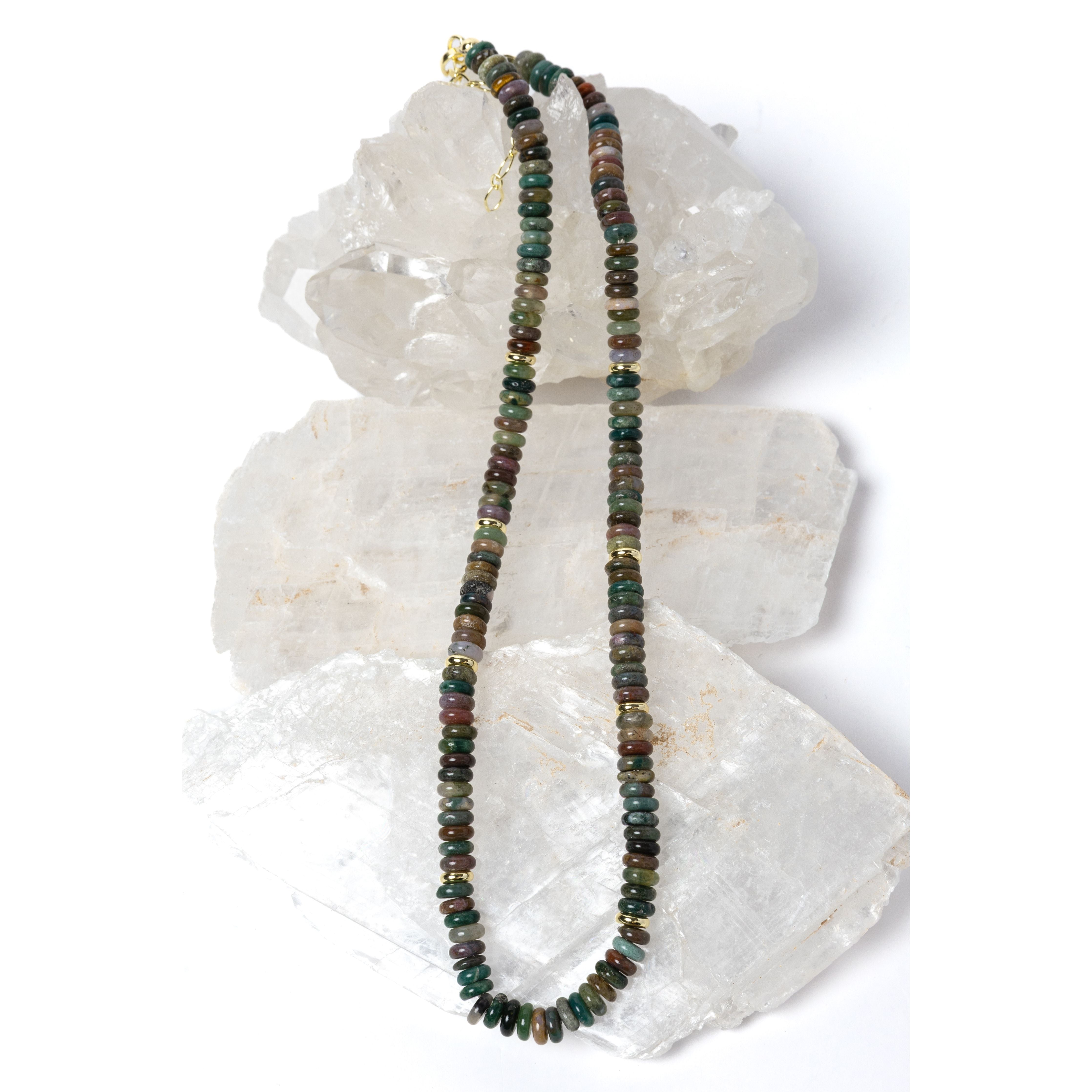 Elegant multicolor gemstone strand necklace composed of smooth natural stone rondelles with organic earth-toned variations and polished gold spacer accents.