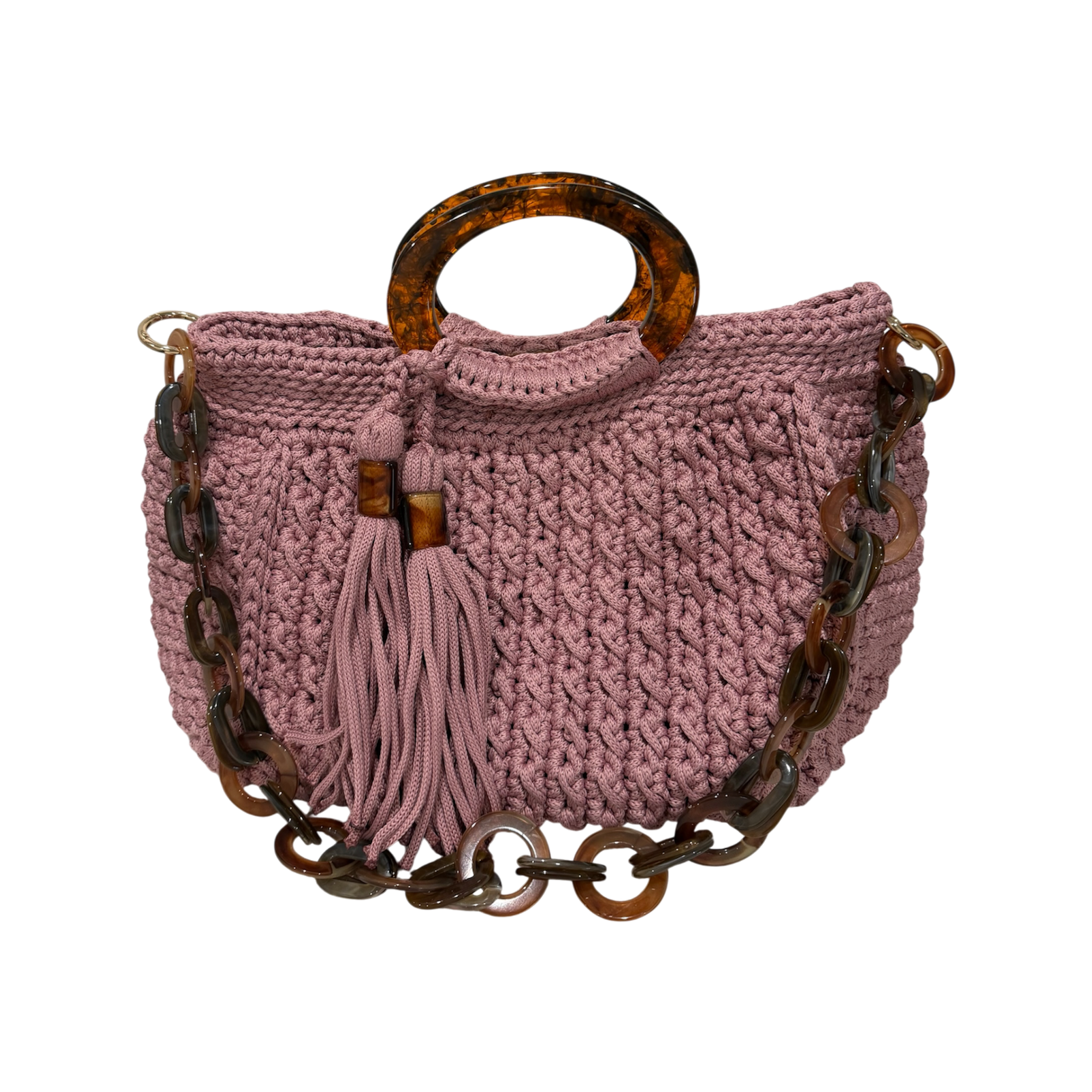 Muted pink hand-crocheted Giselle handbag with dark marbled resin handle, coordinating resin chain, tassel detail, and softly structured silhouette.