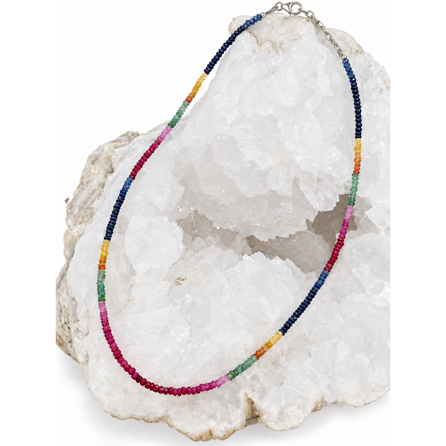 Aurora Mosaic 18-inch gemstone necklace with blue and yellow sapphires, emeralds and rubies arranged in graduated color variations, finished with a 2-inch sterling silver extension.