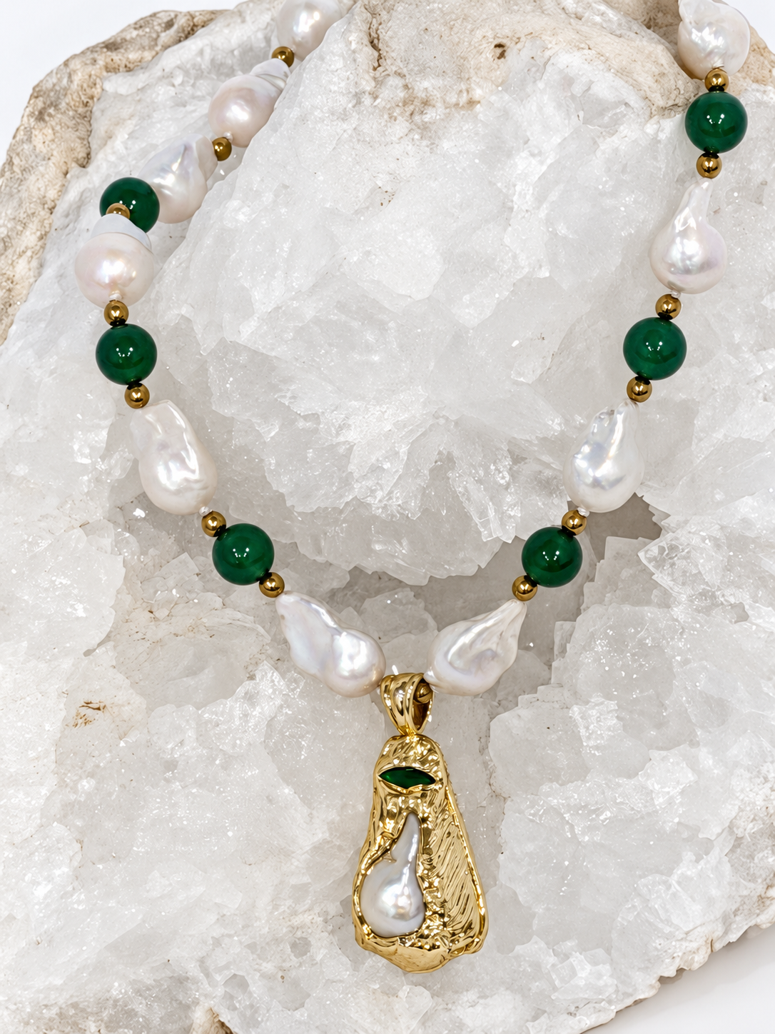 Natural baroque pearl and green agate necklace featuring gold-plated brass accents and a distinctive statement pendant.