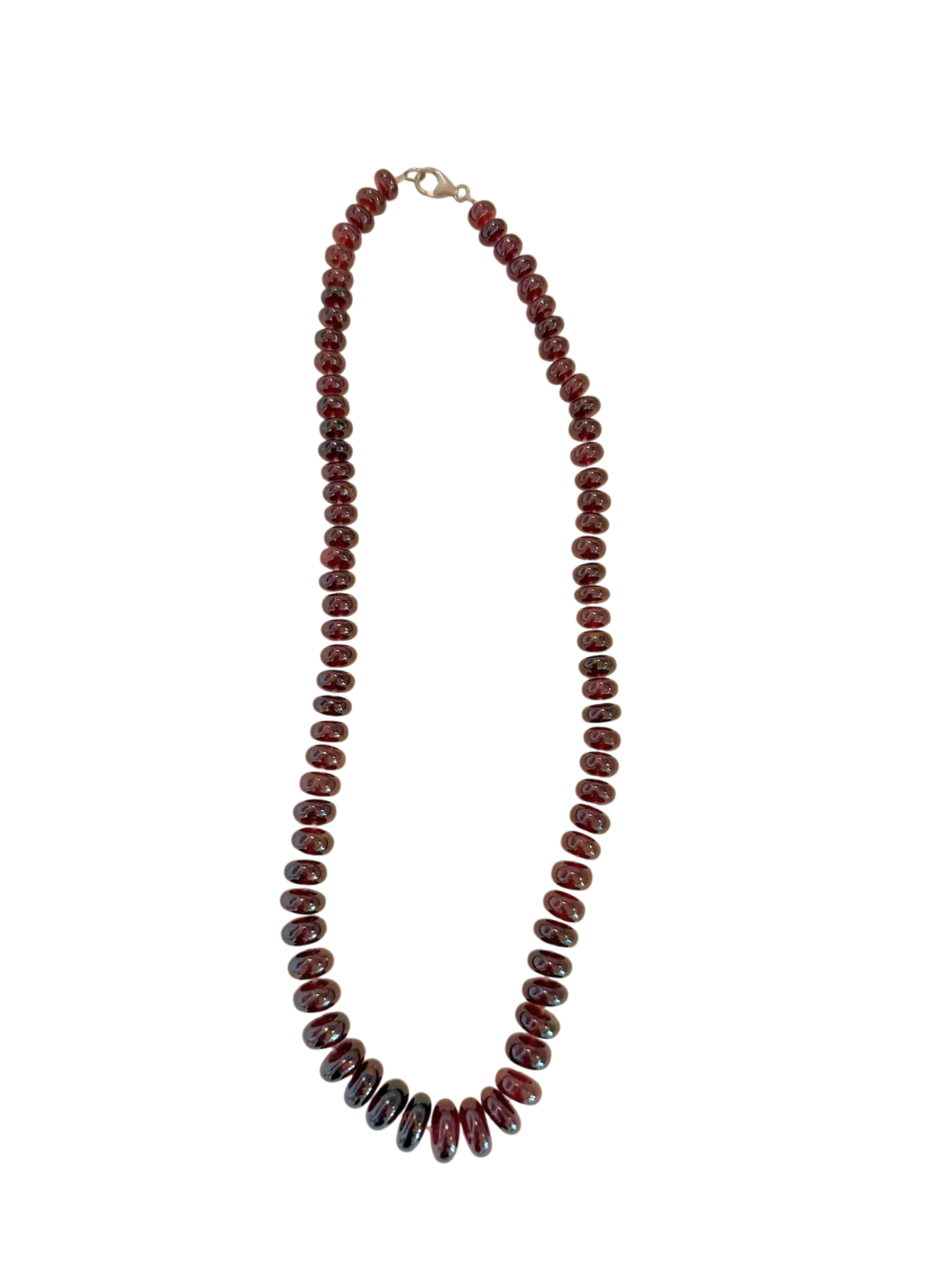 One-of-a-kind 715-carat garnet necklace featuring richly saturated graduated garnet rondelles in deep wine hues, elegantly arranged in a 22-inch silhouette and finished with a sterling silver clasp.