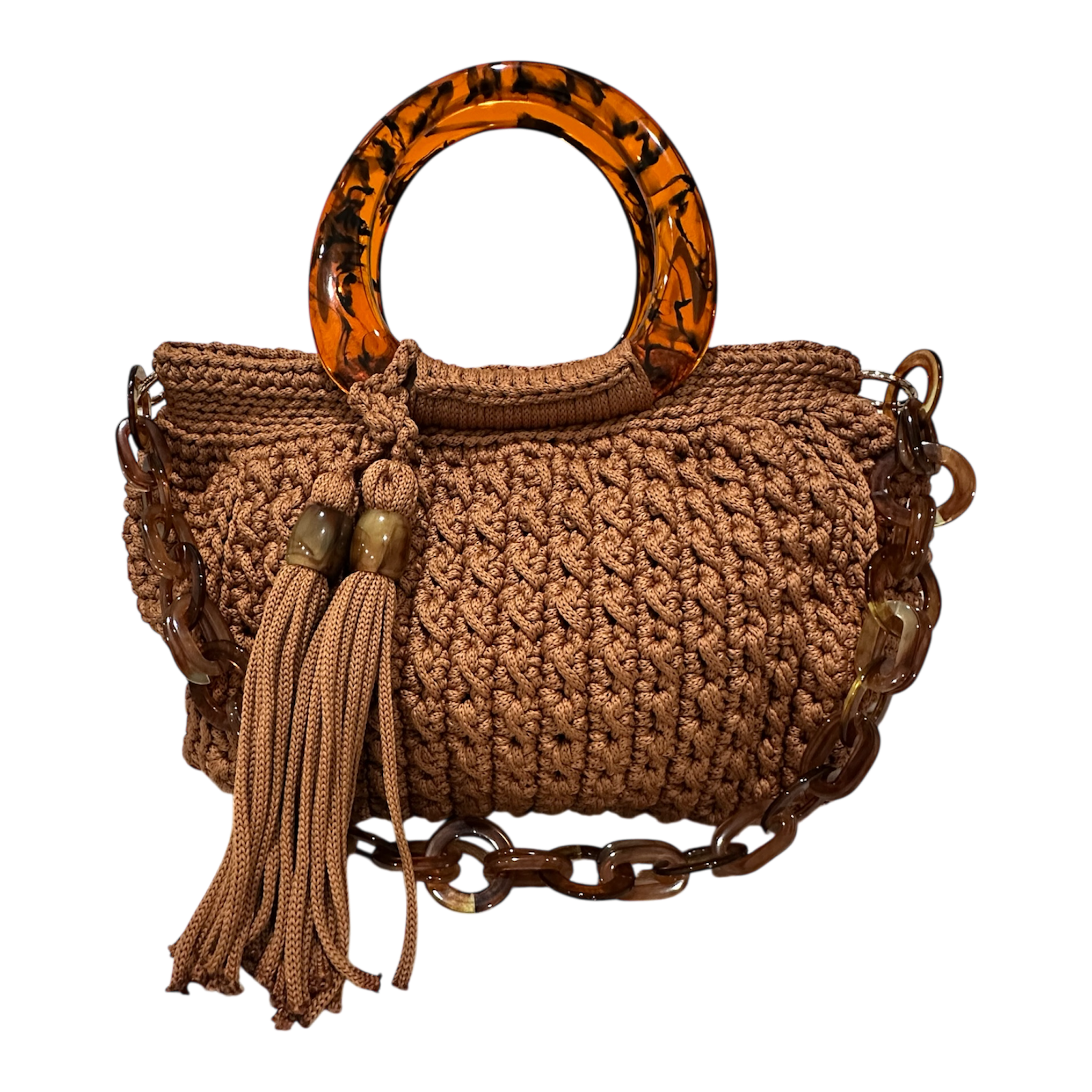 Giselle Terraburly handbag, hand-crocheted luxury bag in rich earthy brown tone with sculptural resin handle, intricate crochet texture, flowing tassel and chain strap
