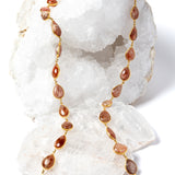     Copper Rain 35-inch natural sunstone necklace with gold-plated settings and warm copper, peach, and amber tones.