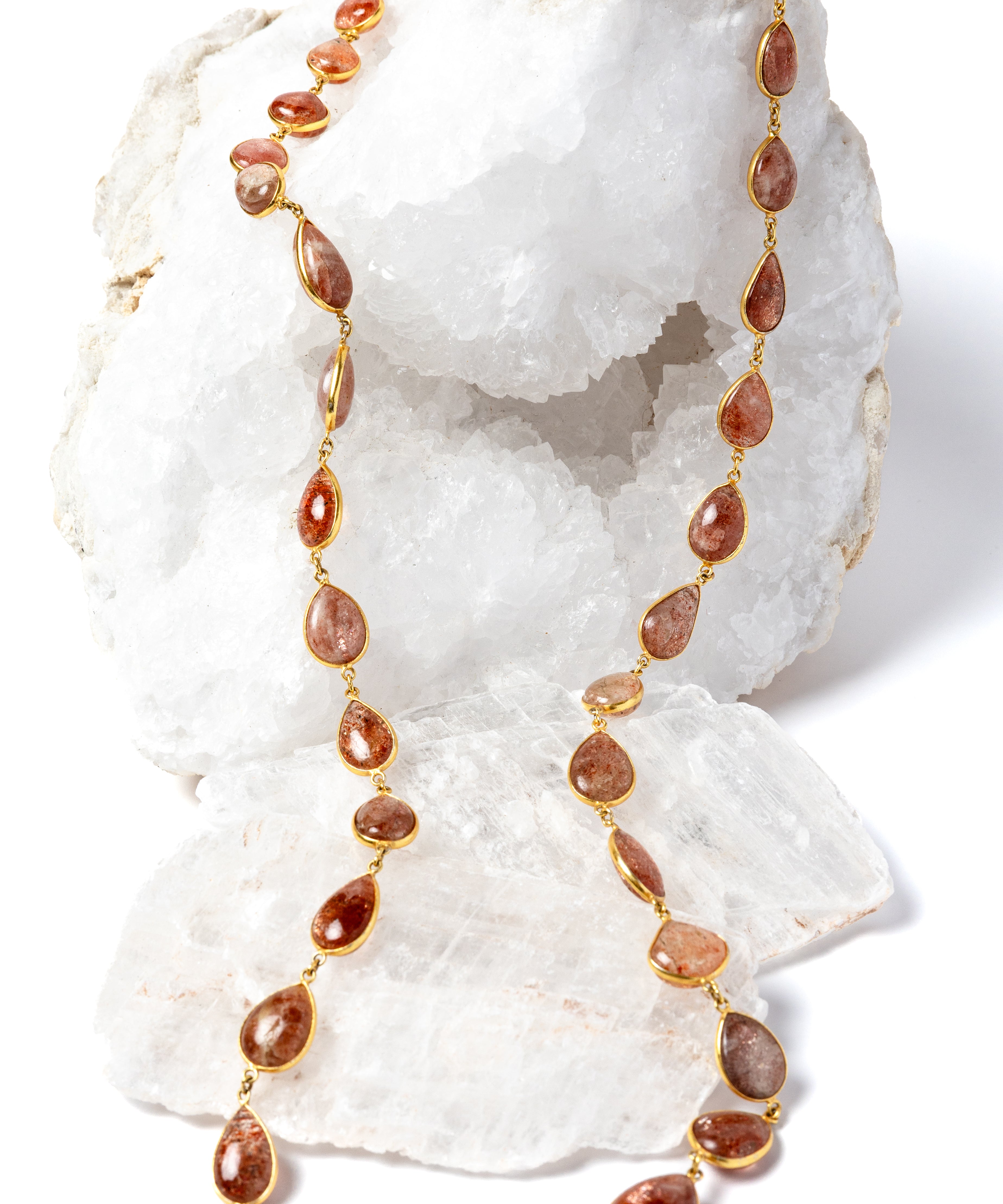     Copper Rain 35-inch natural sunstone necklace with gold-plated settings and warm copper, peach, and amber tones.