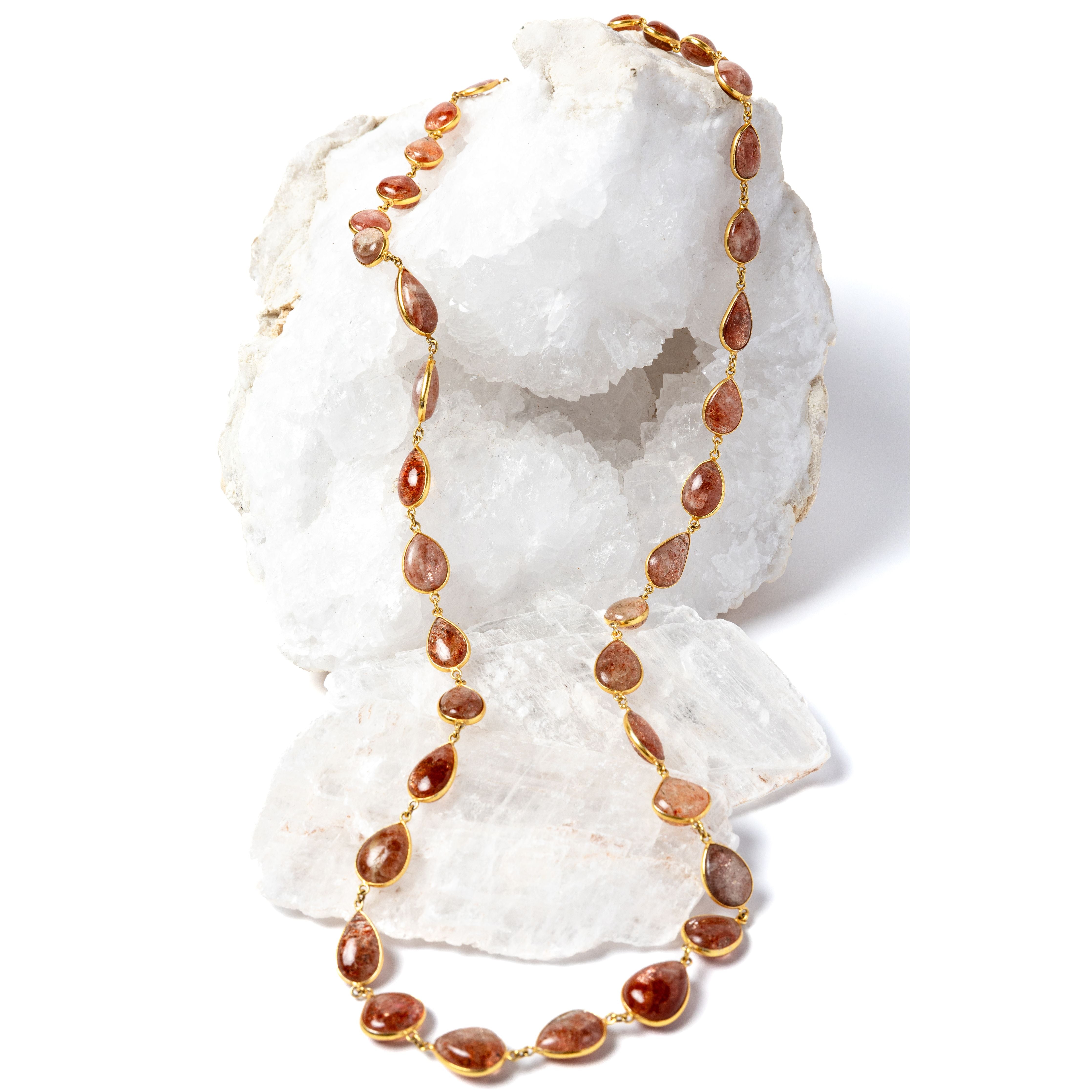     Copper Rain 35-inch natural sunstone necklace with gold-plated settings and warm copper, peach, and amber tones.
