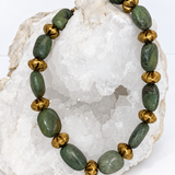 El Dorado one-of-a-kind necklace with vintage green turquoise, aged-gold vintage brass beads and oversized lobster clasp