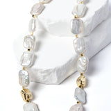 Luxury flat baroque freshwater pearl necklace featuring high-luster organically shaped pearls, gold-plated accents, and an elegant timeless design.