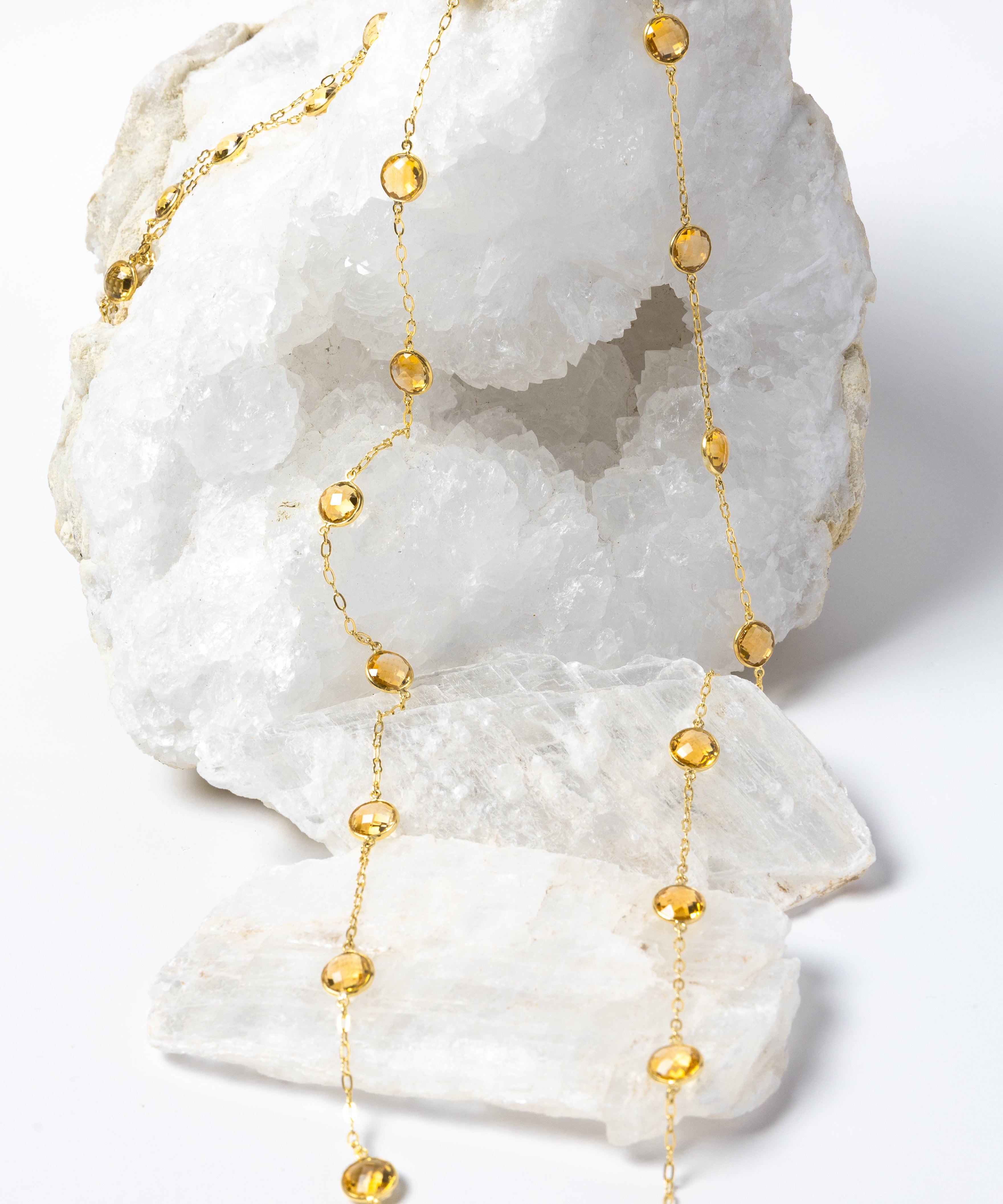Golden Hour Citrine Necklace featuring natural faceted citrine gemstones in gold-plated bezel settings, styled as a graceful long necklace with radiant golden color and timeless elegance.