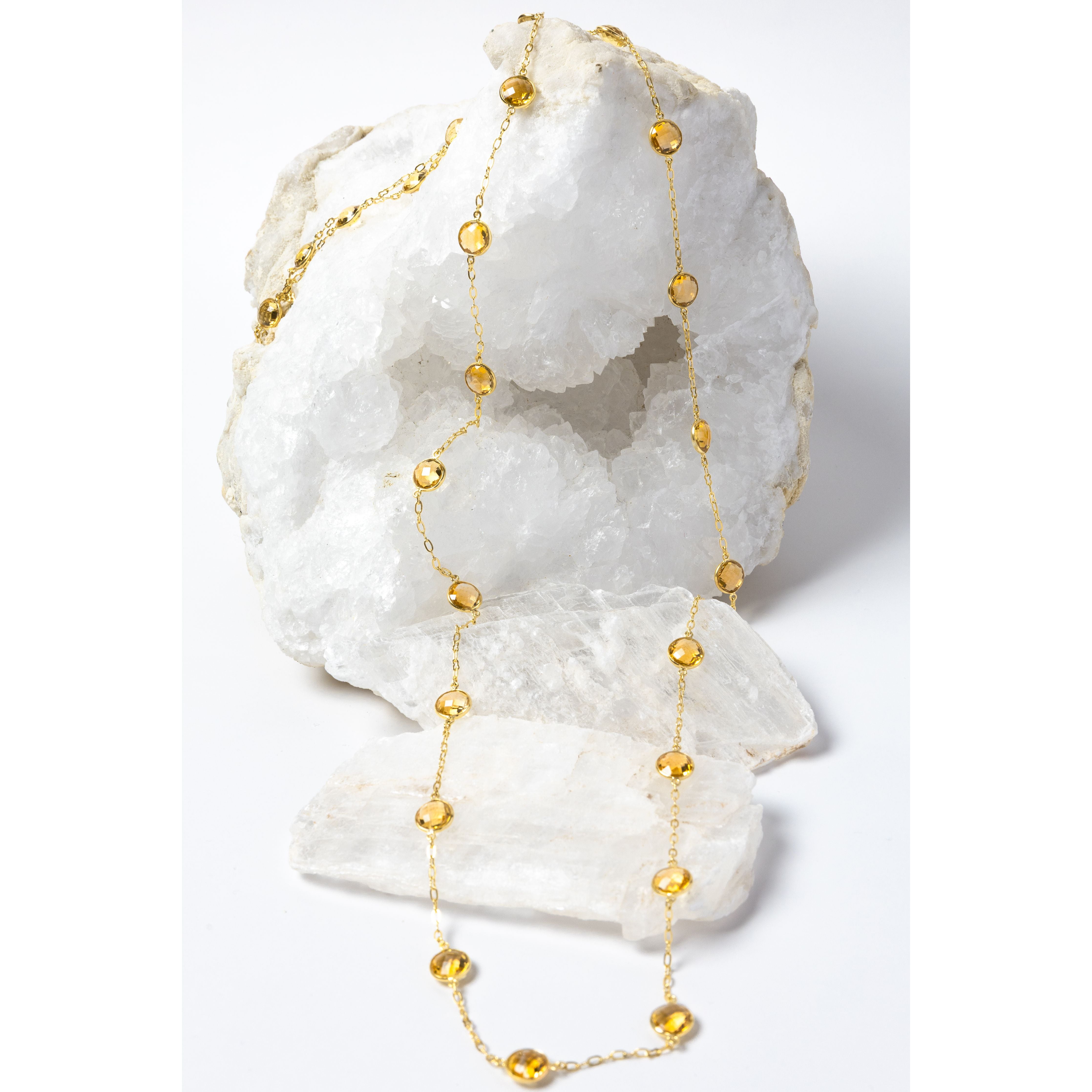 Golden Hour Citrine Necklace featuring natural faceted citrine gemstones in gold-plated bezel settings, styled as a graceful long necklace with radiant golden color and timeless elegance.