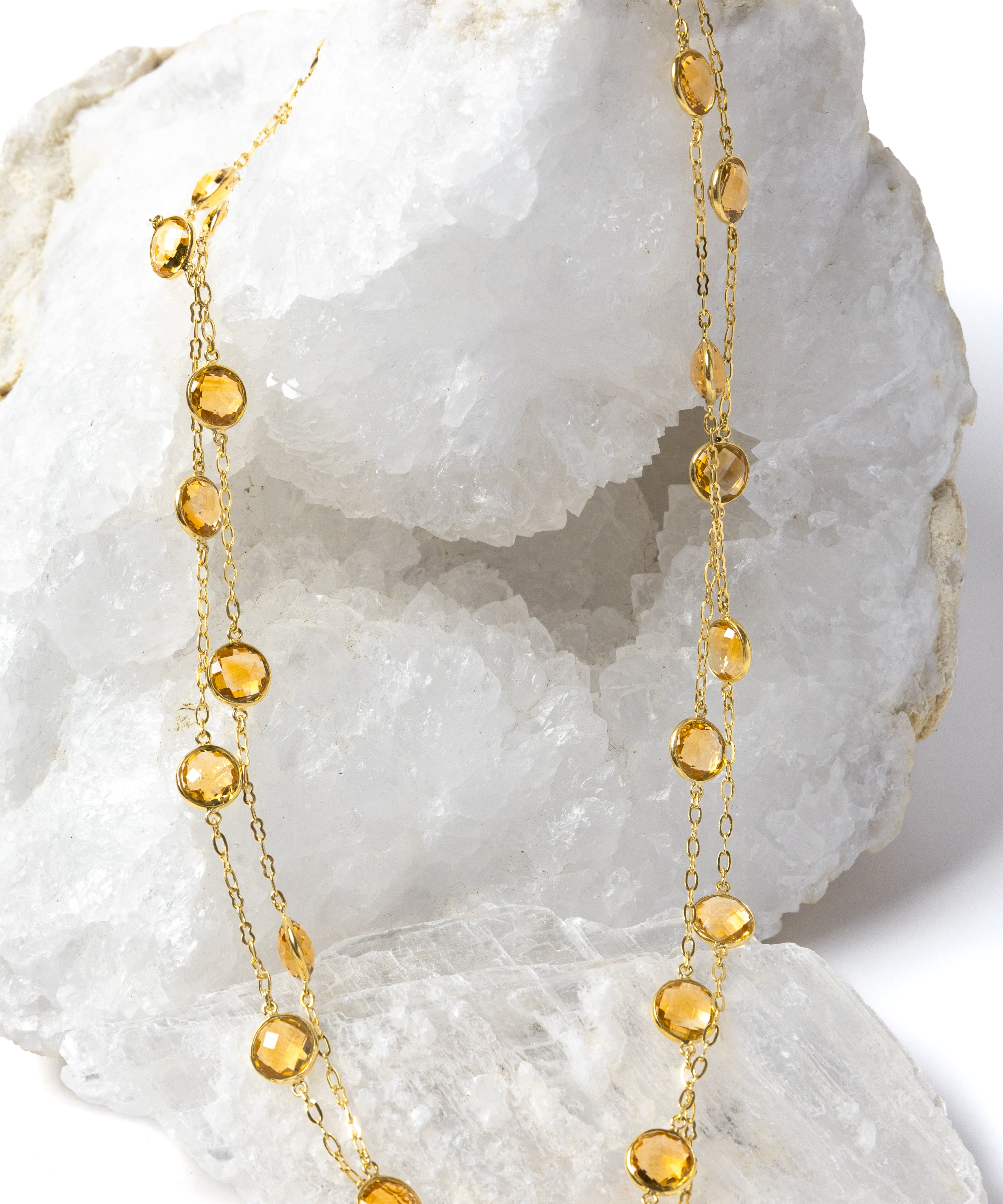 Golden Hour Citrine Necklace styled as a two-strand necklace, showcasing natural faceted citrine gemstones in gold-plated bezel settings for an elegant and versatile look.