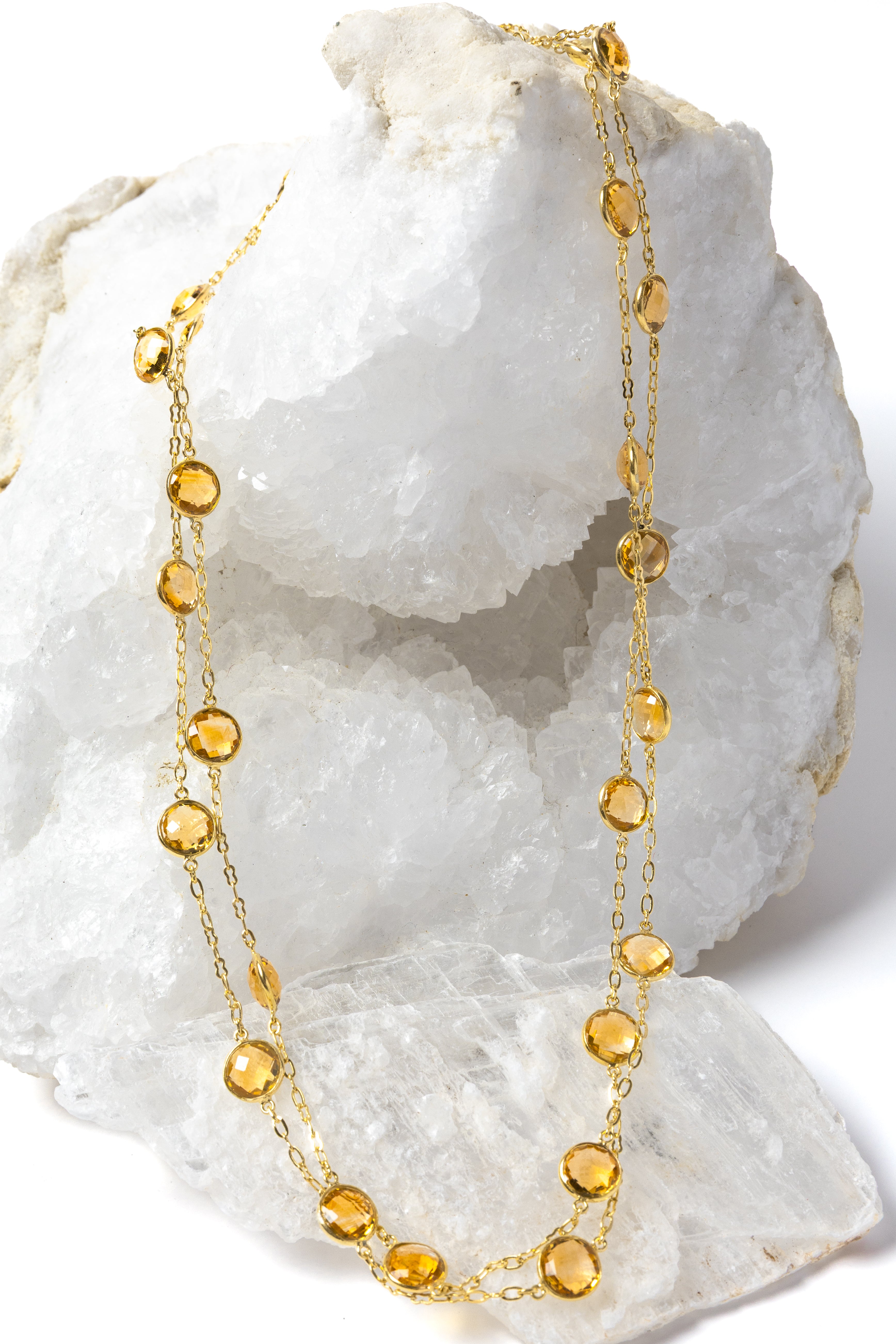 Golden Hour Citrine Necklace styled as a two-strand necklace, showcasing natural faceted citrine gemstones in gold-plated bezel settings for an elegant and versatile look.