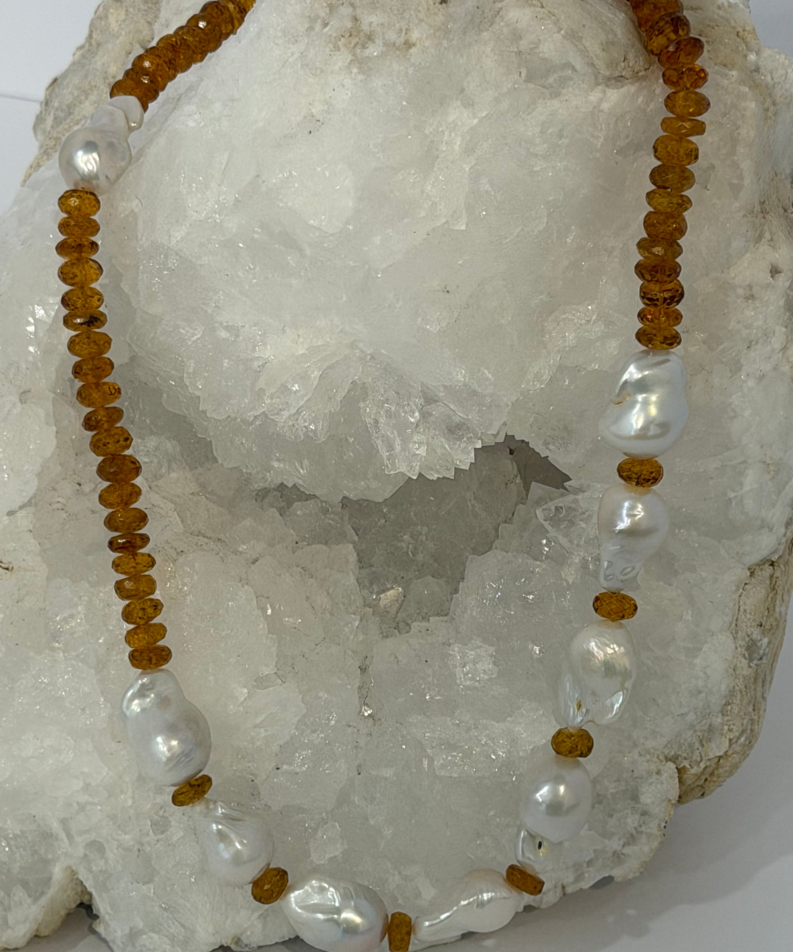 Golden Velvet necklace featuring deep golden citrine rondelles and a concentrated arrangement of natural baroque pearls across the front.