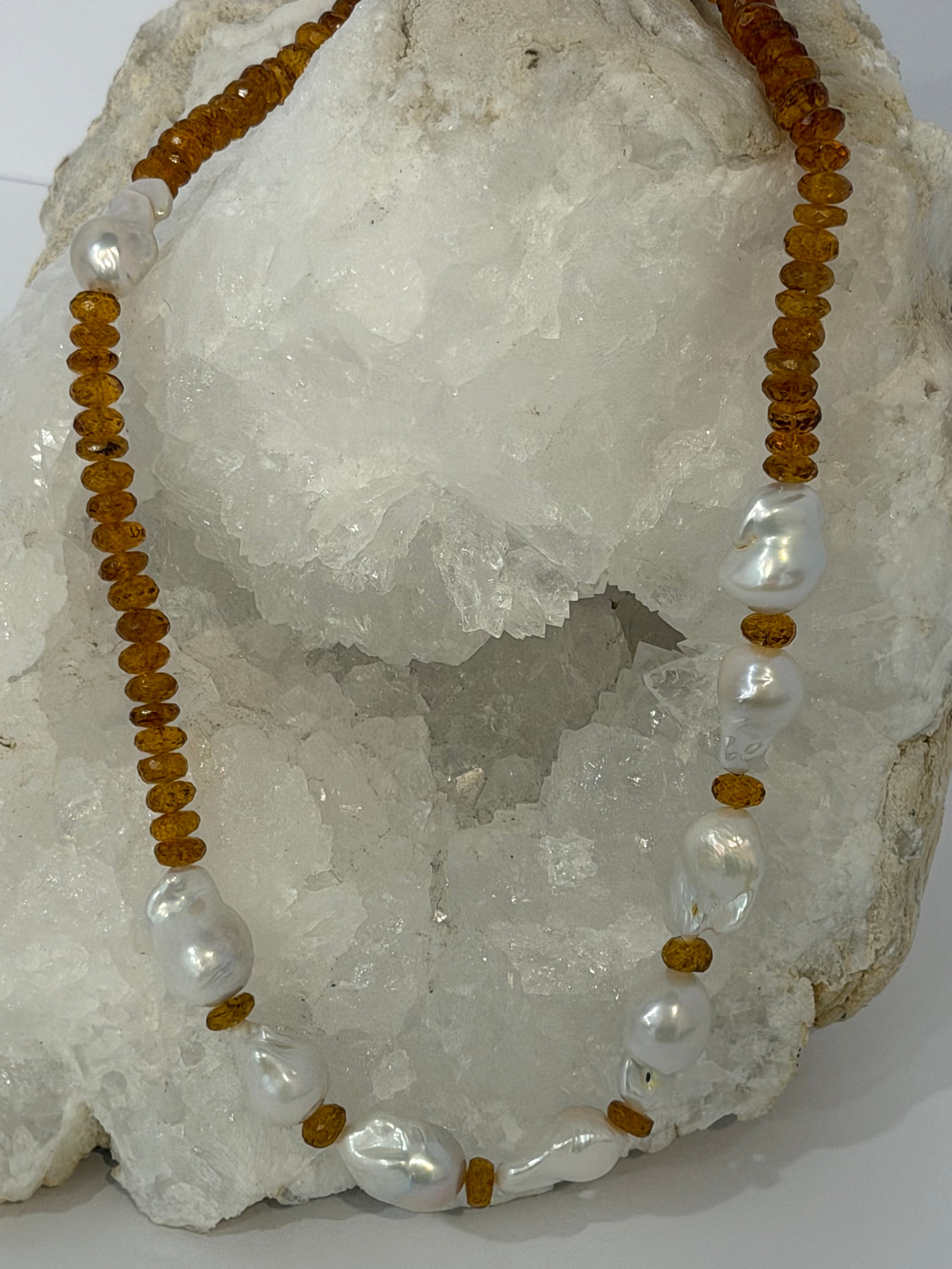 Golden Velvet necklace featuring deep golden citrine rondelles and a concentrated arrangement of natural baroque pearls across the front.