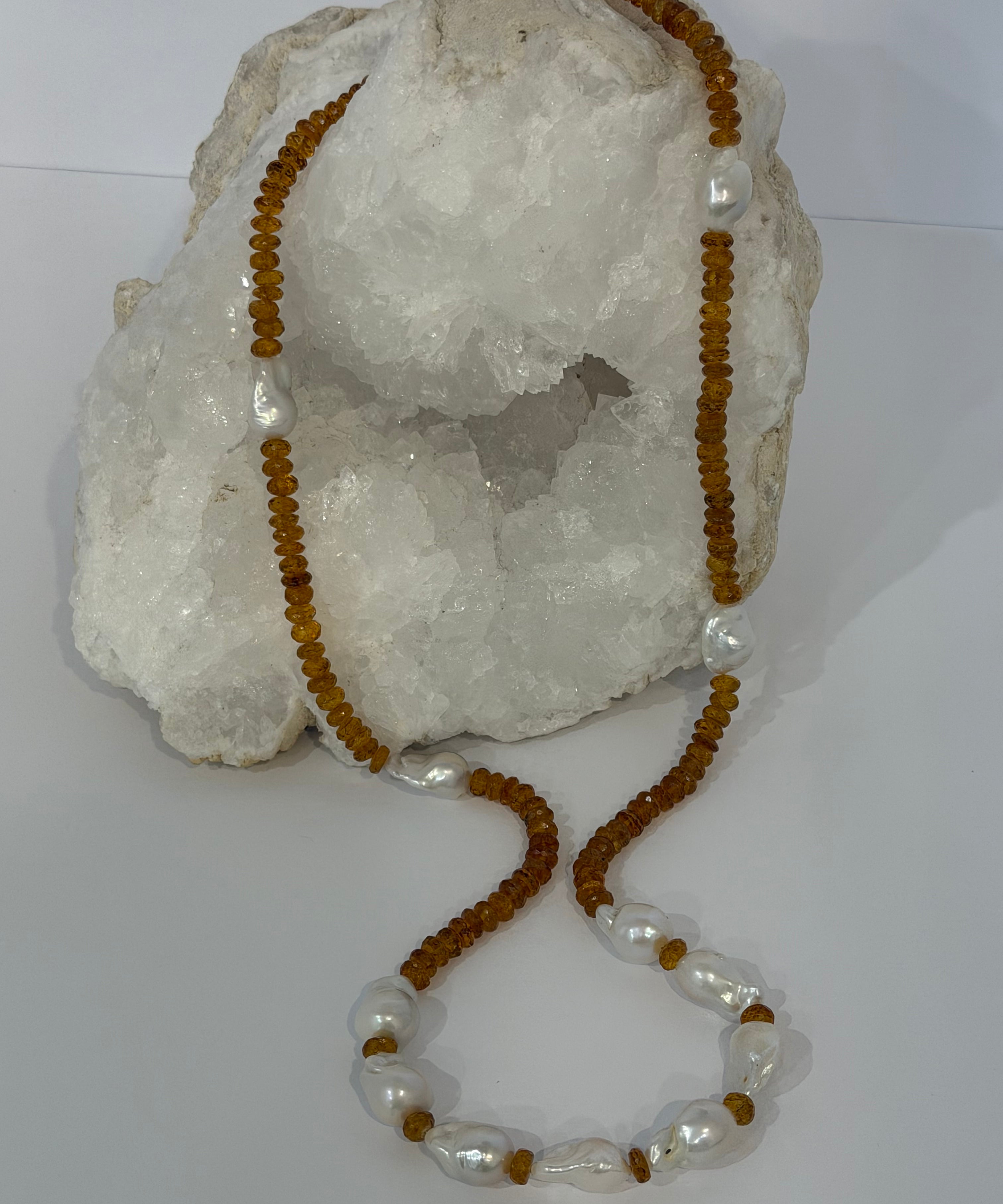 Golden Velvet Necklace a 33-inch necklace with deep golden natural citrine rondelles and luminous baroque pearls arranged throughout the long strand.