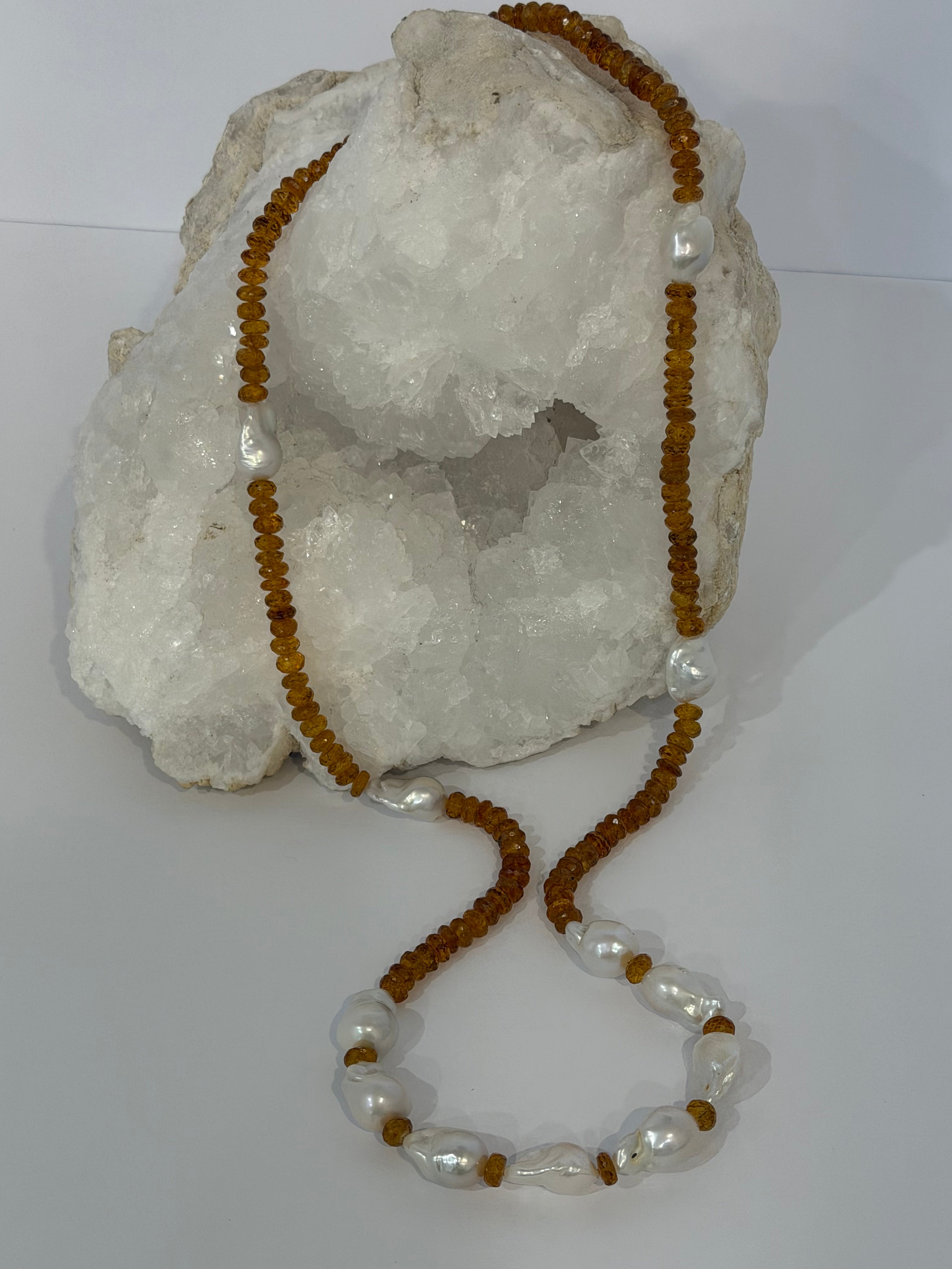 Golden Velvet Necklace a 33-inch necklace with deep golden natural citrine rondelles and luminous baroque pearls arranged throughout the long strand.