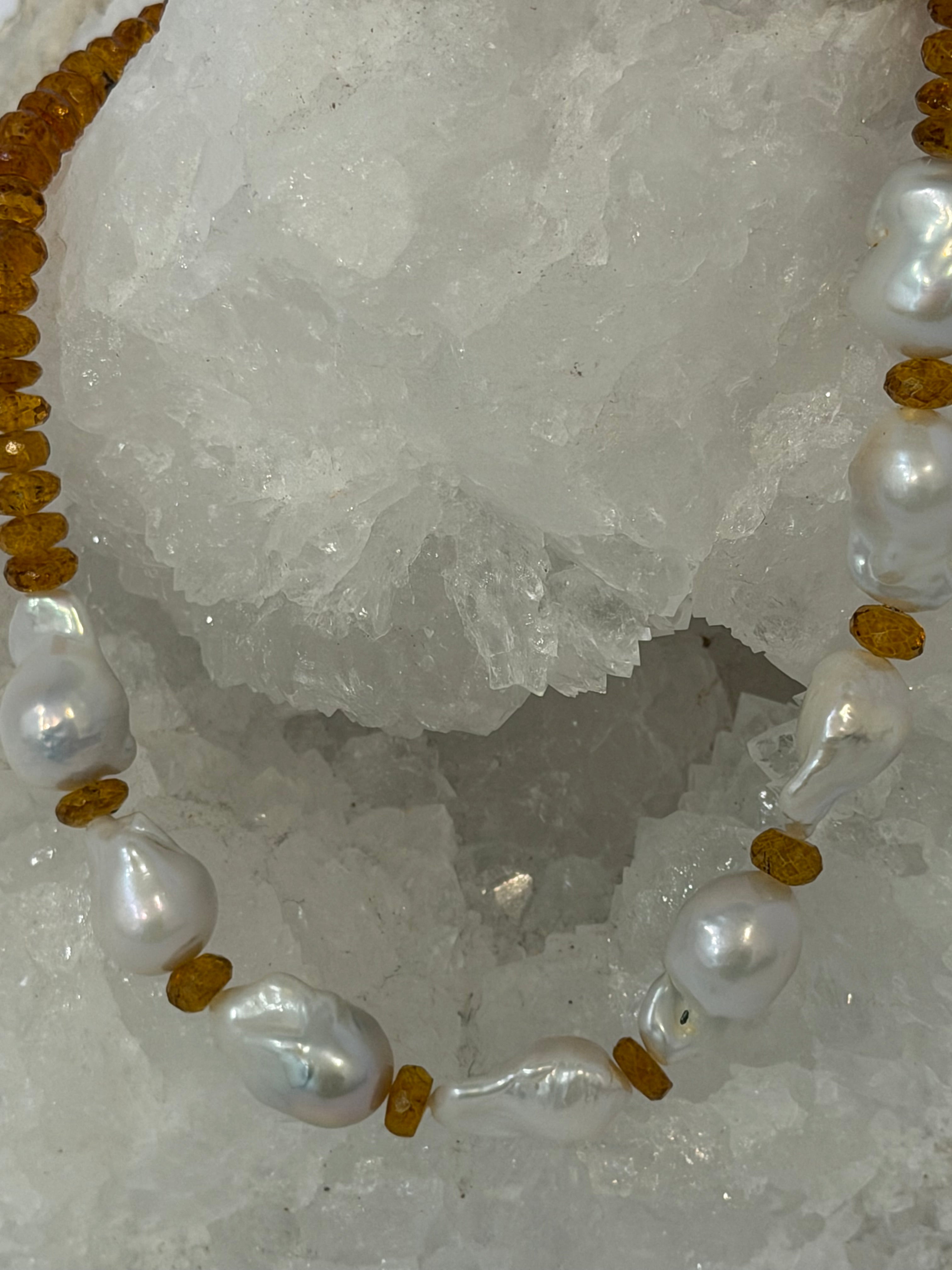Close-up of luminous natural baroque pearls separated by deep golden faceted citrine rondelles in the Golden Velvet necklace.