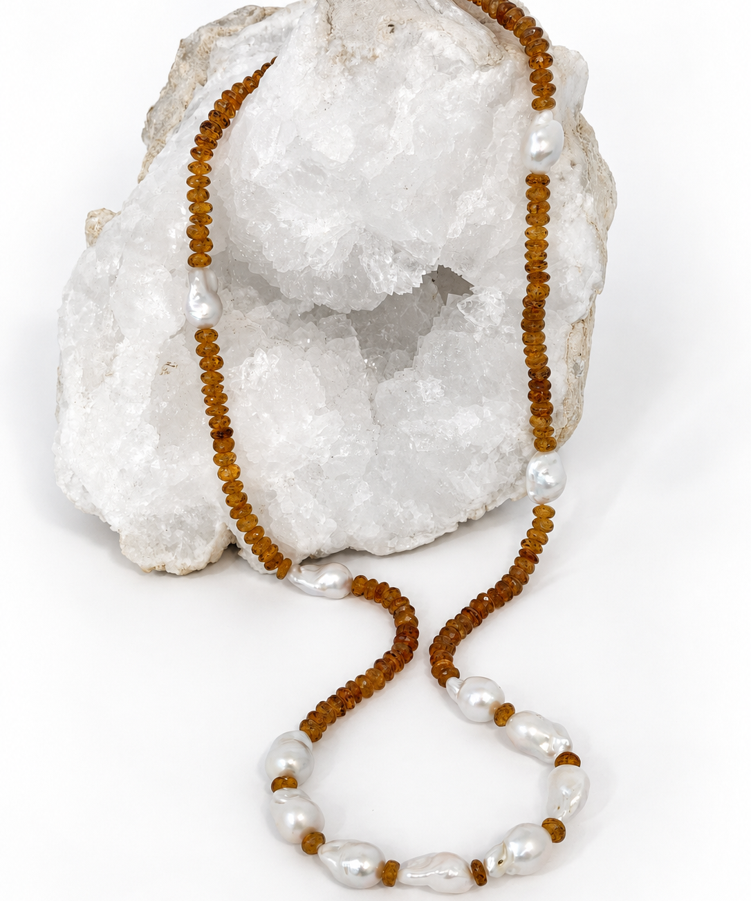 Golden Velvet 33-inch necklace with deep golden natural citrine rondelles and luminous white baroque pearls arranged throughout the long strand.