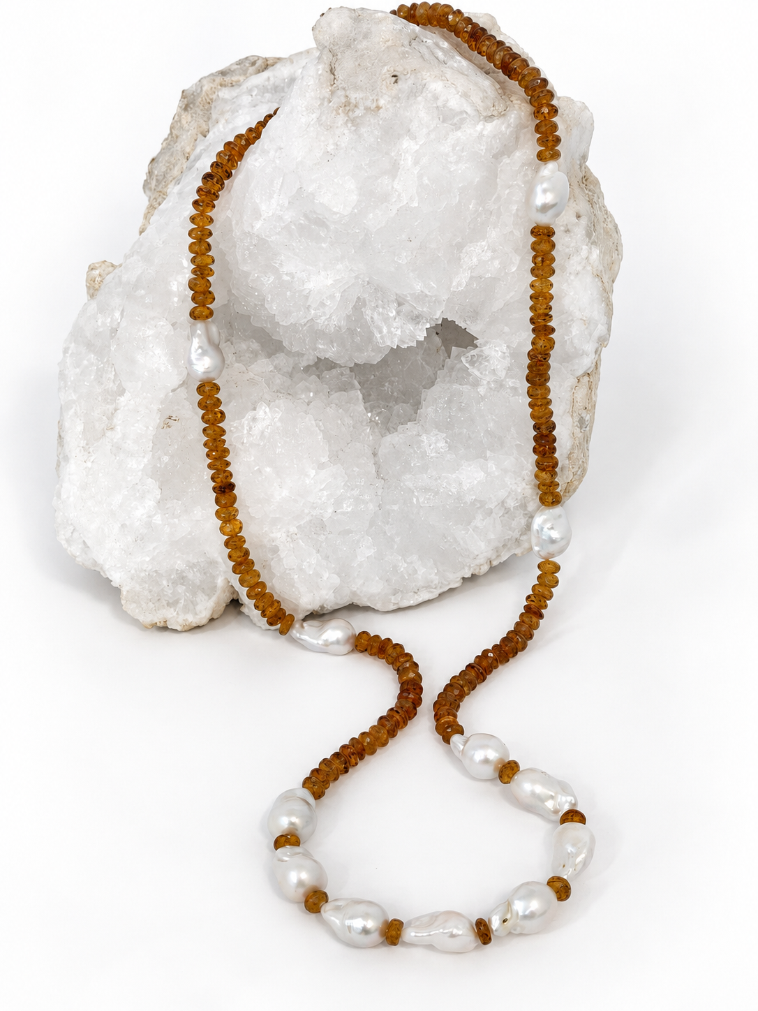 Golden Velvet 33-inch necklace with deep golden natural citrine rondelles and luminous white baroque pearls arranged throughout the long strand.