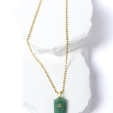 Green Aventurine Gem Charm Necklace featuring a faceted natural green aventurine pendant accented with a cubic zirconia detail and suspended from a delicate gold-plated beaded chain 