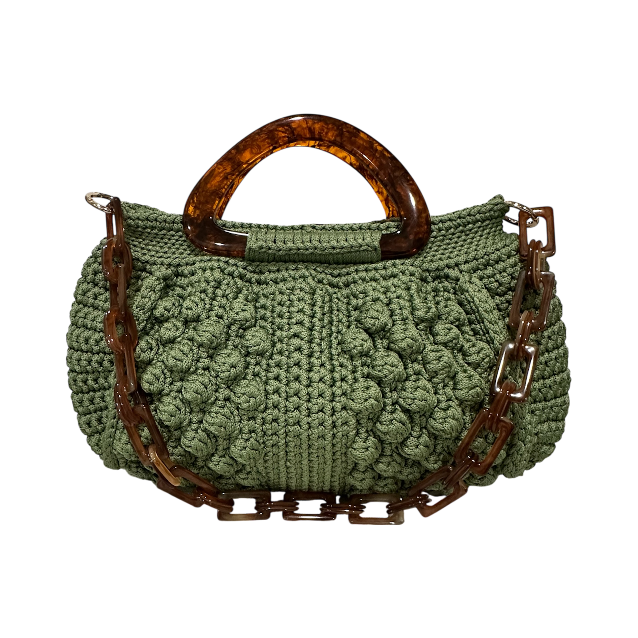 Hand-crocheted Paloma handbag in a soft sage green tone with textured stitching, featuring a sculptural resin top handle and a coordinating chain strap.