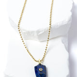Natural Lapis Lazuli Gem Charm Necklace featuring a faceted royal-blue gemstone pendant with natural golden inclusions, cubic zirconia accent, and gold-plated beaded chain 