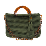Deep olive hand-crocheted Monique handbag featuring a rounded marbled resin handle, coordinating resin-link chain, and twin tassel details.