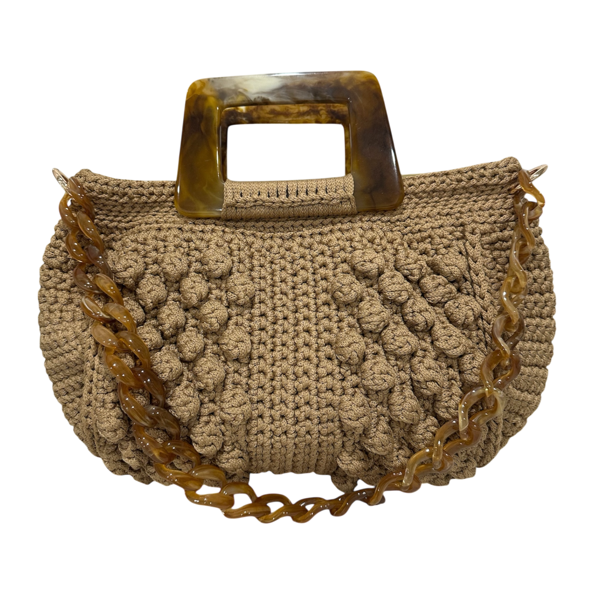 Hand-crocheted Paloma handbag in a warm camel beige tone with dimensional textured stitching, featuring a marbled amber resin top handle and a coordinating chain strap.
