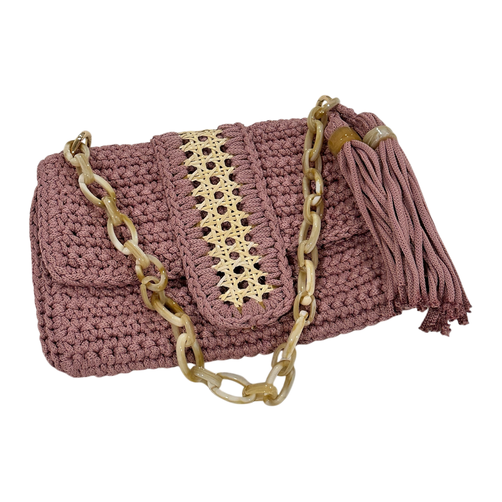 Close-up of natural fiber rattan panel on blush Camille clutch with crochet texture
