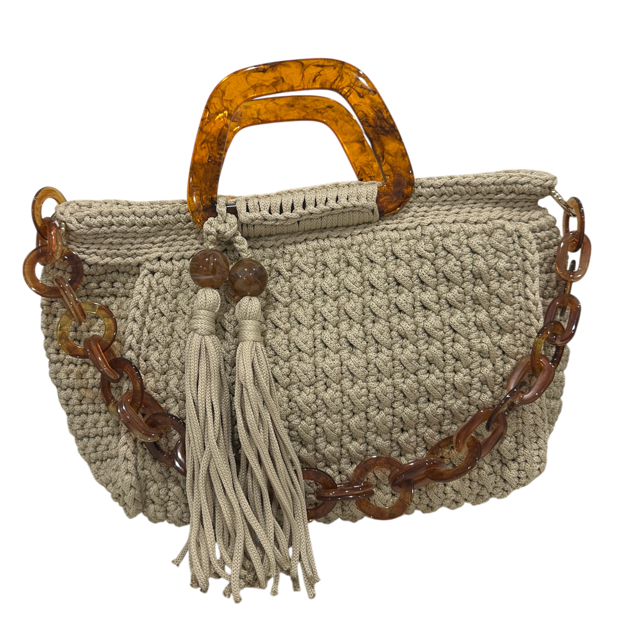 Hand-crocheted Giselle handbag in a warm beige-earth tone with dimensional textured stitching, featuring sculptural amber-marbled resin round handles, a coordinating resin chain strap, and two silky tassels finished with polished resin bead accents.  