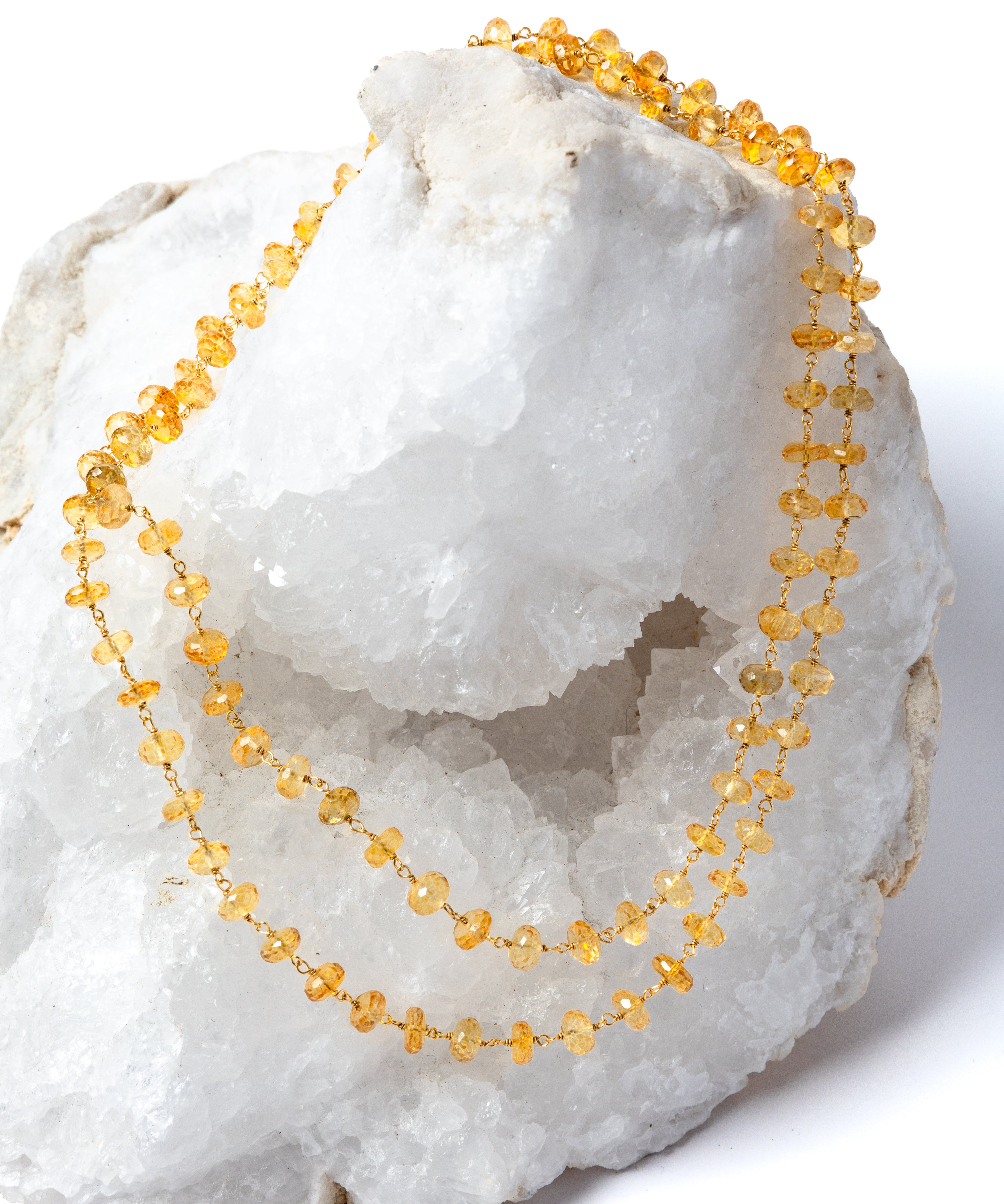 Sunkissed natural citrine necklace styled as a shorter double strand, showcasing its versatile 36-inch length and luminous golden gemstones.