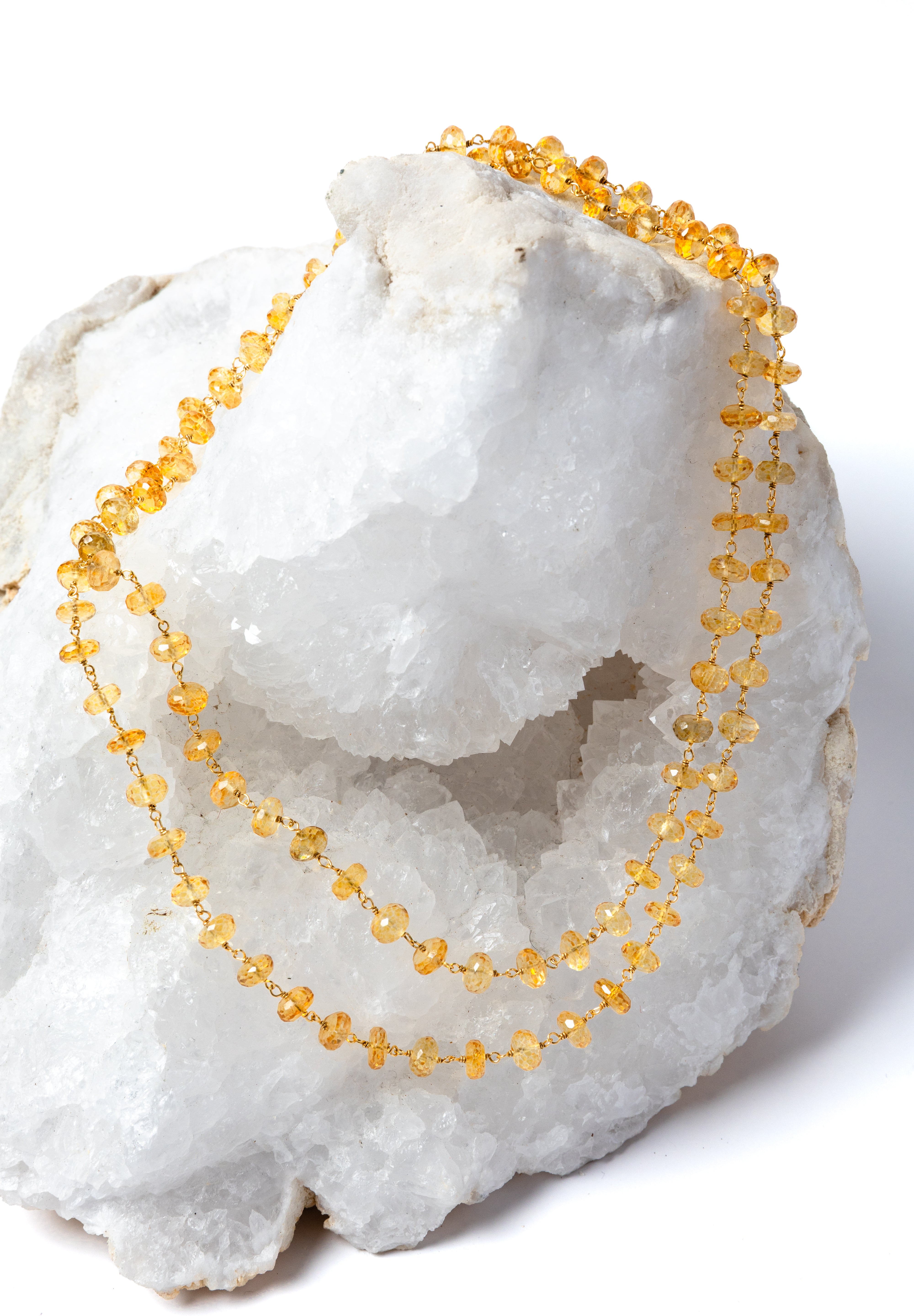 Sunkissed natural citrine necklace styled as a shorter double strand, showcasing its versatile 36-inch length and luminous golden gemstones.