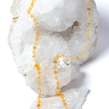 Sunkissed 36-inch natural citrine necklace featuring intensely golden-yellow faceted gemstones and gold-plated details.