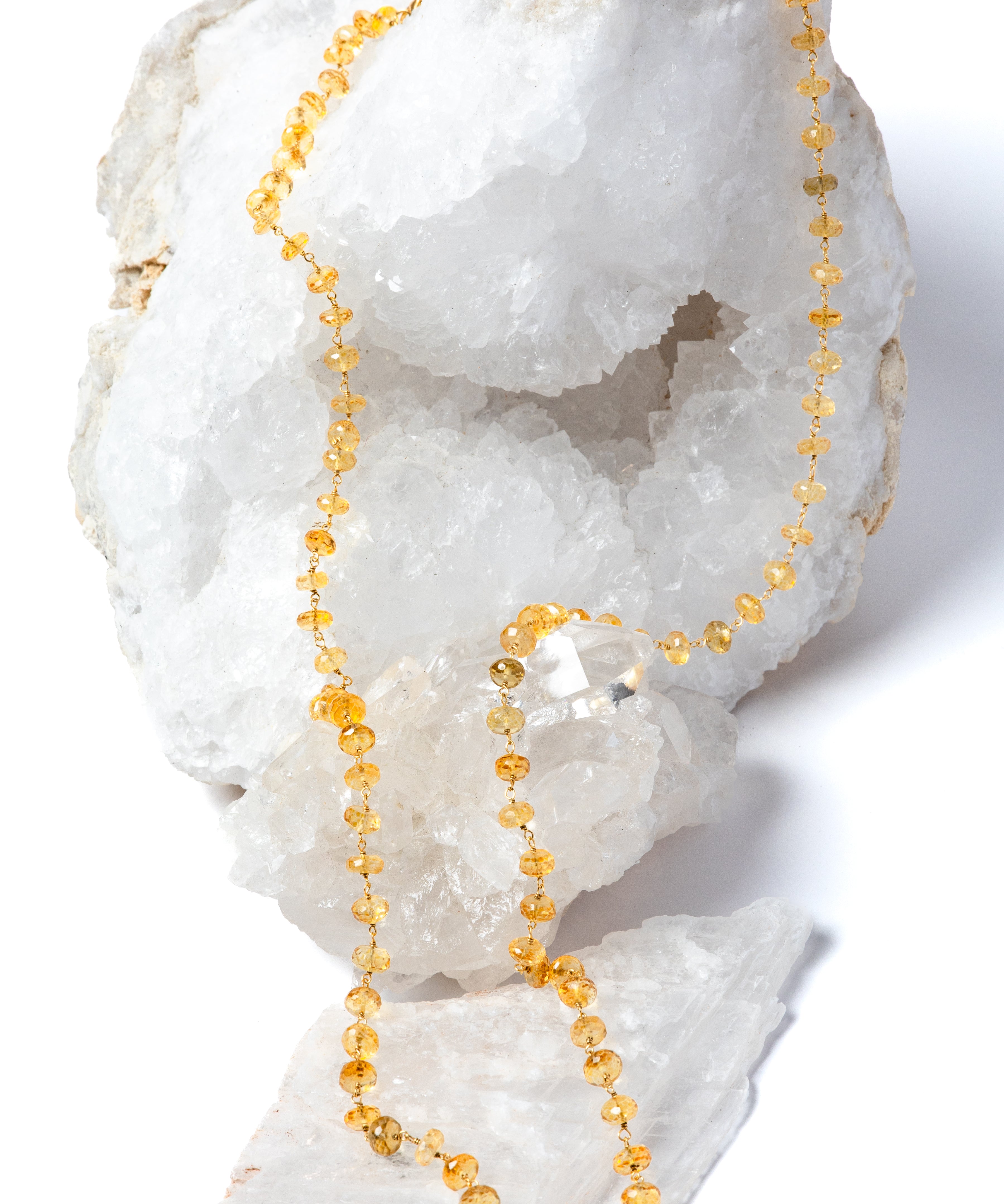 Sunkissed 36-inch natural citrine necklace featuring intensely golden-yellow faceted gemstones and gold-plated details.